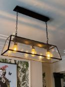 A set of 2 x Ramesses lantern pendants in bronze and clear glass 84cm wide x 75cm drop (Location