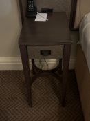 A pair of nightstands with a single drawer, The drawer features a textured, woven, front panel and a