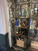 Etagere wine storage rack metal construction open display featuring various tiered shelves and