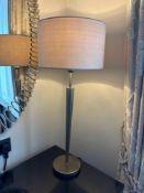 Numirra modern table lamp featuring a slender metal stand matte finish, and a neutral-toned fabric