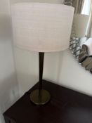 Numirra modern table lamp featuring a slender metal stand matte finish, and a neutral-toned fabric