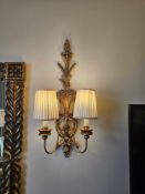 A pair of Twin-Arm Neoclassical Sconces in Antiqued Gold with Pleated Shades and Foliate