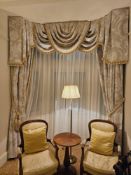 A pair of drapes A tailored curtain ensemble comprising full-length drapes with a silk trim fully