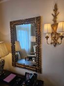 Neoclassical Giltwood Frame with Braided Detailing and Floral Rosettes A rectangular wall-mounted
