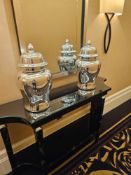 A pair Silver Ceramic Urn by Asiatides, Paris Reflective glazed vessel with rounded shoulders and