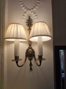 A pair of antique brass twin arm wall appliques with shades ( Loc 356)