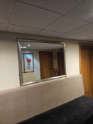 A framed bevelled mirror in silvered wood frame 133 x 103cm [Loc 1st Floor Corridor]