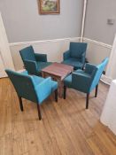 A set of four Danubio teal upholstered contract armchairs with curved backrests and solid wood