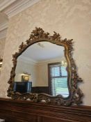 Rococo Revival Style Ornate wall mirror in carved frame, richly moulded with scrolling acanthus