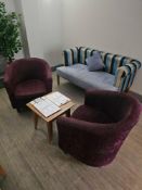 A pair of modern upholstered tub chair with a rounded back and curved arms textured fabric in