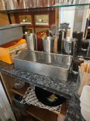 A large quantity of barman accessories generally jiggers, cocktail shakers, mats, strainers etc as
