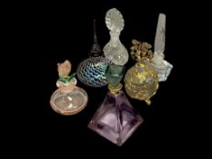SIX GLASS PERFUME BOTTLES INCLUDING ART GLASS, GILDED DESIGN, AND FIGURAL PINK ROSE