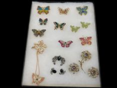 ASSORTED RHINESTONE BROOCHES FEATURING MOSTLY BUTTERFLIES WITH DAZZLING ACCENTS