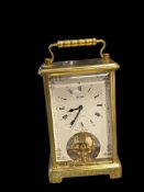 BULOVA CARRIAGE TABLE CLOCK, 8-DAY, BIG WHEEL WITH IVORY AND BLACK FACE, MADE IN WEST GERMANY