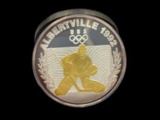 1992 ALBERTVILLE U.S. OLYMPIC NHL HOCKEY TEAM 2 TROY OUNCE .999 FINE SILVER COIN WITH GOALIE DESIGN