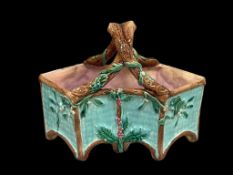 19TH CENTURY VICTORIAN MAJOLICA BASKET DECORATED WITH BERIES AND LEAF DESIGN  WITH TWIG HANDLE