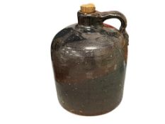 LATE 19TH CENTURY BROWN STONEWARE DRIP GLAZE POTTERY WHISKEY JUG WITH HANDLE AND CORK STOPPER