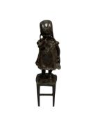 SCULPTED CAST BRONZE SCULPTURE OFF YOUNG GIRL IN NIGHT GOWN STANDING ON STOOL