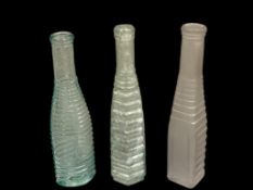 THREE ANTIQUE RIBBED PEPPER SAUCE BOTTLES IN AQUA AND PURPLE GLASS