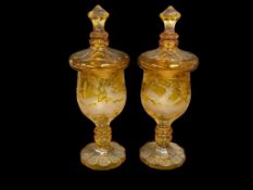 PAIR OF HAND CUT AMBER TO CLEAR FORREST / WILDLIFE SCENE ETCHED PEDESTAL CANDY JARS CIRCA 1930'S