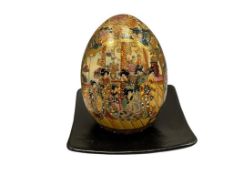 SATSUMA HEAVILY DECORATED ENAMELED AND GILT PORCELAIN CHINESE EGG