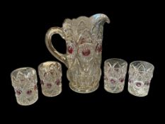 VICTORIAN PERIOD CUT GLASS PITCHER AND MATCHING CUPS WITH CRANBERRY HAND COLORED ACCENTS