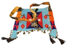 19TH CENTURY NATIVE AMERICAN HAND BEADED HORSE MARTINGALE ADORNED WITH BELLS, HORSEHAIR, AND MIRR...