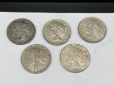 FIVE U.S. PEACE SILVER DOLLARS INCLUDING TWO 1922-D, 1922-S, AND TWO 1922