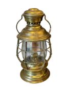 20TH CENTURY BRASS NAUTICAL LANTERN WITH CLEAR GLASS SHADE AND BADGER BURNER