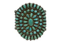 ANTIQUE NATIVE AMERICAN NEEDLEPOINT TURQUOISE CUFF BRACELET FEATURING A PLETHORA OF TURQUOISE