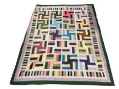 VINTAGE HAND MADE PATCHWORK QUILT FEATURING GEOMETRIC SHAPES AND SMALL FLOWER QUILT