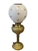 20TH CENTURY THE MILLER LAMP CO ELECTRIFIED POLISHED BRASS PARLOR LAMP WITH FLEUR DE LIS GLOBE