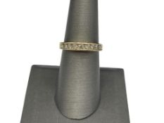 14K YELLOW GOLD ROUND BRILLIANT CUT DIAMOND BAND FEATURING NINE DIAMONDS