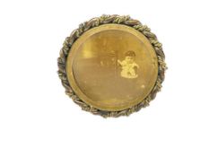 ANTIQUE GOLD FILLED MOURNING BROOCH FEATURING SEPIA TONED PHOTOGRAPH OF INFANT BY CRADLE