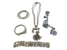 SILVER TONED COSTUME JEWELRY INCLUDING STATEMENT NECKLACE, SET OF BANGLES, FIGURAL ZEBRA, AND MORE