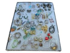 DOZENS OF PAIRS OF LADIES FASHION COSTUME JEWELRY EARRINGS INCLUDING SOME STERLING SILVER