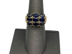 GOLD TONE STERLING SILVER LAB BLUE SAPPHIRE FASHION RING FEATURING OVAL CUT LAB SAPPHIRES