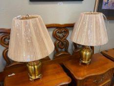 PAIR OF ELEGANT BRUSHED BRASS TABLE LAMPS WITH ASIAN THEMED FOOTED BASE