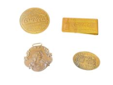VINTAGE COCA-COLA MEMORABILIA VENDOR PIN, FREE BOTTLE TOKEN, WORLDS FAIR MONEY CLIP, AND BUCKLE