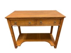 ANTIQUE QUARTER SEWN OAK DESK WITH TWO DRAWERS AND BRASS PULLS