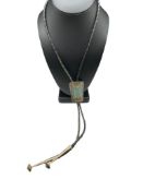 VINTAGE NAVAJO STERLING SILVER CRUSHED TURQUOISE AND CORAL INLAID BOLO TIE