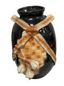 TALL MIRRORED BLACK GLAZE STUDIO POTTERY VASE DECORATED WITH RIBBON AND WHOLE GARLIC