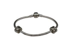 PANDORA DESIGNER STERLING SILVER CHARM BRACELET AND TWO BEADS