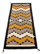 EARLY 1900'S NAVAJO RUG FEATURING GEOMTERIC PATTERN