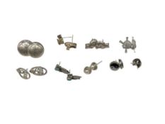 NINE PAIRS OF STERLING SILVER EARRINGS FEATURING VARIOUS DESIGNS