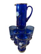 BOHEMIA COBALT BLUE GLASS PITCHER WITH SIX MATCHING GLASSES, GILT AD ENAMELED DESIGN