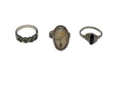 THREE STERLING SILVER FASHION RINGS INCLUDING ONYX, PERIDOT, AND AGATE