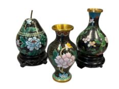 BLACK CLOISONNE ENAMELED CHINESE VESSELS INCLUDING TWO MINIATURE VASES AND PEAR COVERED JAR