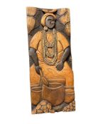 TRADITIONAL CARVED WOOD PANEL DEPICTING AFRICAN WOMAN IN A TRADITIONAL SETTING