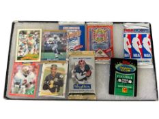 LOOSE AND UNOPENED SPORT CARD PACKS BASKETBALL, FOOTBALL, AND BASEBALL